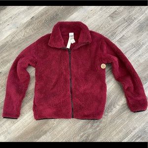 Red, plush, zip up, never worn